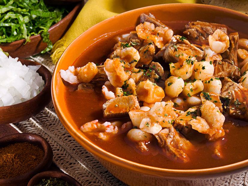 Bowl of Holy Chipotle Flamin’ Posole with pork and white corn hominy